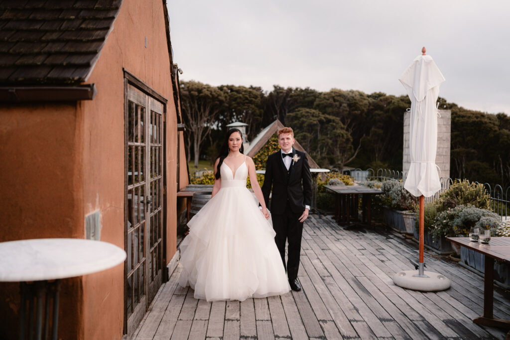 mud brick rooftop bride and groom